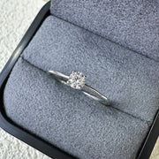 Classic Round-Cut Moissanite Rings with Four-Prong Setting